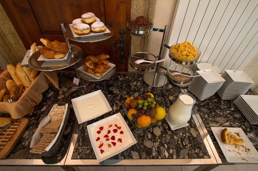 Three Storks Hotel Prague Exterior photo A continental breakfast buffet